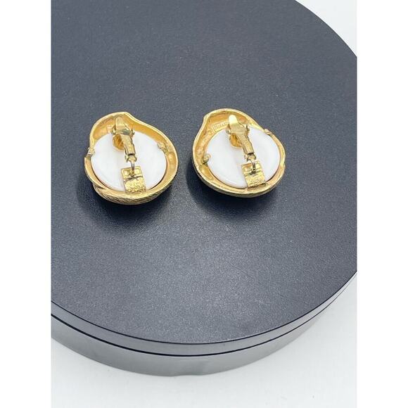 Trifari 1980s Gold Tone Resin Sea Shell Design Statement Clip
Earrings - Picture 9 of 12